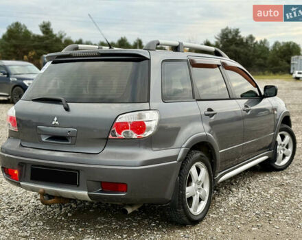 Серый Мицубиси Аутлендер, объемом двигателя 2 л и пробегом 199 тыс. км за 5999 $, фото 7 на Automoto.ua