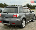 Серый Мицубиси Аутлендер, объемом двигателя 2 л и пробегом 199 тыс. км за 5999 $, фото 7 на Automoto.ua