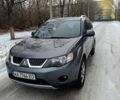 Серый Мицубиси Аутлендер, объемом двигателя 2.4 л и пробегом 244 тыс. км за 8900 $, фото 2 на Automoto.ua
