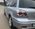 Серый Мицубиси Аутлендер, объемом двигателя 2 л и пробегом 247 тыс. км за 5999 $, фото 6 на Automoto.ua