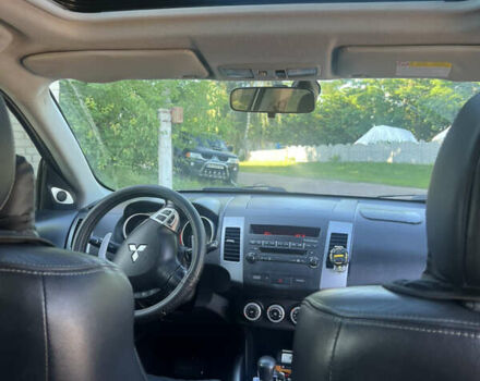 Серый Мицубиси Аутлендер, объемом двигателя 2.36 л и пробегом 245 тыс. км за 9300 $, фото 6 на Automoto.ua