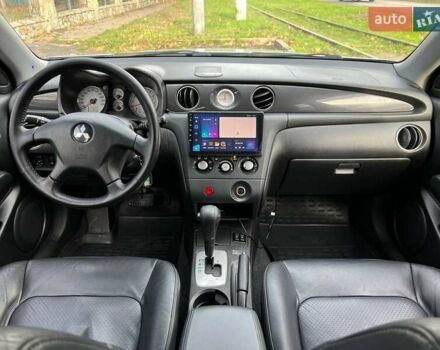 Серый Мицубиси Аутлендер, объемом двигателя 2.38 л и пробегом 170 тыс. км за 6900 $, фото 13 на Automoto.ua