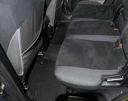 Серый Мицубиси Аутлендер, объемом двигателя 2.4 л и пробегом 238 тыс. км за 7200 $, фото 6 на Automoto.ua