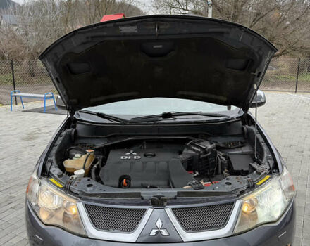 Сірий Міцубісі Аутлендер, об'ємом двигуна 2 л та пробігом 237 тис. км за 8999 $, фото 54 на Automoto.ua