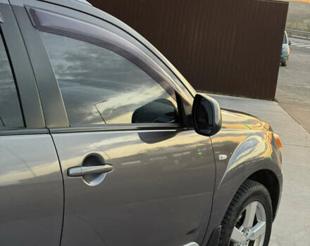 Серый Мицубиси Аутлендер, объемом двигателя 2.4 л и пробегом 210 тыс. км за 8300 $, фото 9 на Automoto.ua