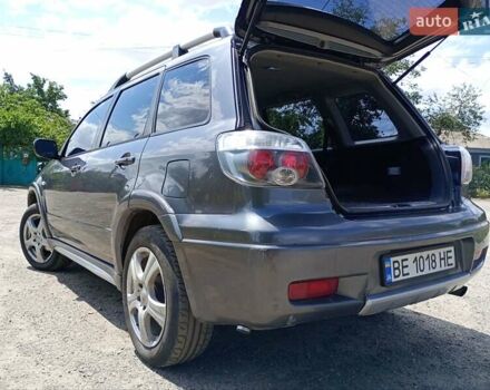 Серый Мицубиси Аутлендер, объемом двигателя 2.35 л и пробегом 342 тыс. км за 6900 $, фото 5 на Automoto.ua