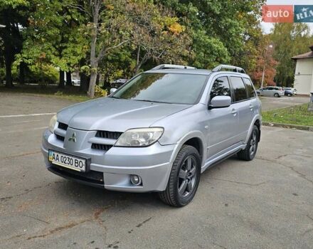 Сірий Міцубісі Аутлендер, об'ємом двигуна 2.38 л та пробігом 200 тис. км за 5600 $, фото 12 на Automoto.ua