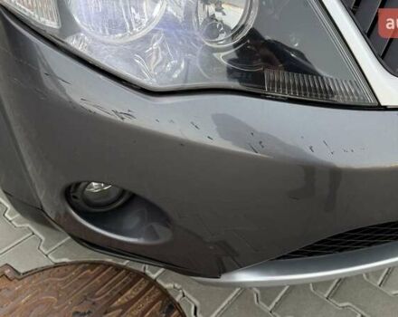 Серый Мицубиси Аутлендер, объемом двигателя 2.4 л и пробегом 174 тыс. км за 9599 $, фото 25 на Automoto.ua