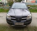 Серый Мицубиси Аутлендер, объемом двигателя 2.38 л и пробегом 160 тыс. км за 8300 $, фото 3 на Automoto.ua