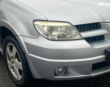 Серый Мицубиси Аутлендер, объемом двигателя 2.4 л и пробегом 324 тыс. км за 6890 $, фото 3 на Automoto.ua