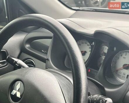 Серый Мицубиси Аутлендер, объемом двигателя 2.4 л и пробегом 324 тыс. км за 6890 $, фото 19 на Automoto.ua