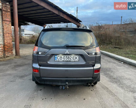 Сірий Міцубісі Аутлендер, об'ємом двигуна 3 л та пробігом 294 тис. км за 8100 $, фото 2 на Automoto.ua