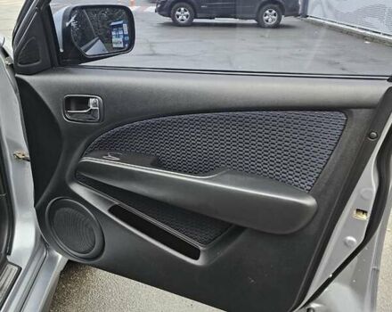 Сірий Міцубісі Аутлендер, об'ємом двигуна 2.38 л та пробігом 230 тис. км за 5700 $, фото 13 на Automoto.ua