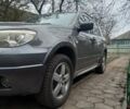 Серый Мицубиси Аутлендер, объемом двигателя 2.38 л и пробегом 143 тыс. км за 7300 $, фото 6 на Automoto.ua