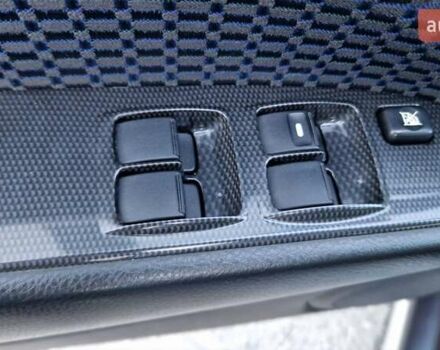 Серый Мицубиси Аутлендер, объемом двигателя 2 л и пробегом 157 тыс. км за 8300 $, фото 25 на Automoto.ua