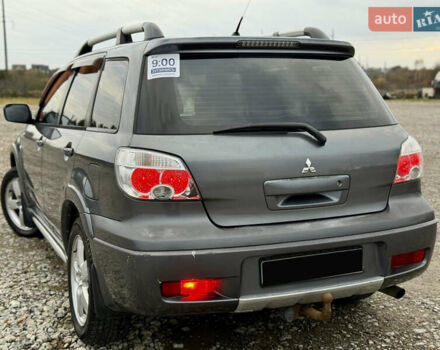 Серый Мицубиси Аутлендер, объемом двигателя 2 л и пробегом 199 тыс. км за 5999 $, фото 10 на Automoto.ua