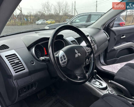 Серый Мицубиси Аутлендер, объемом двигателя 2.4 л и пробегом 61 тыс. км за 11300 $, фото 32 на Automoto.ua