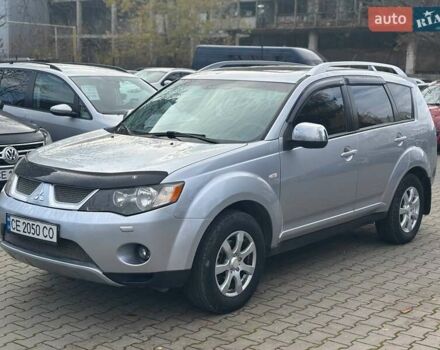 Серый Мицубиси Аутлендер, объемом двигателя 2.36 л и пробегом 237 тыс. км за 8900 $, фото 2 на Automoto.ua