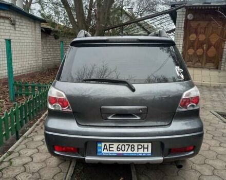 Серый Мицубиси Аутлендер, объемом двигателя 2.38 л и пробегом 143 тыс. км за 7300 $, фото 9 на Automoto.ua