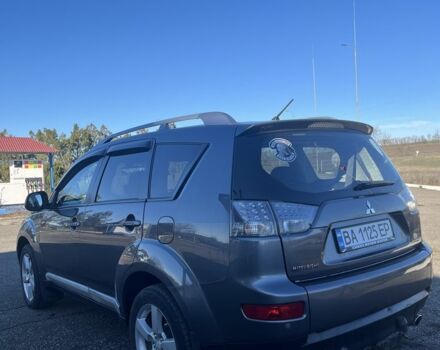 Серый Мицубиси Аутлендер, объемом двигателя 2.4 л и пробегом 213 тыс. км за 7800 $, фото 2 на Automoto.ua