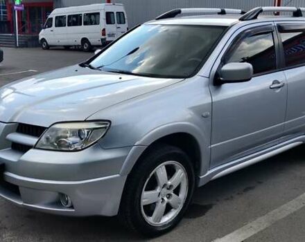 Серый Мицубиси Аутлендер, объемом двигателя 2.38 л и пробегом 323 тыс. км за 6800 $, фото 20 на Automoto.ua