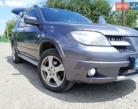 Серый Мицубиси Аутлендер, объемом двигателя 2.35 л и пробегом 342 тыс. км за 6900 $, фото 17 на Automoto.ua