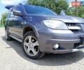 Серый Мицубиси Аутлендер, объемом двигателя 2.35 л и пробегом 342 тыс. км за 6900 $, фото 17 на Automoto.ua