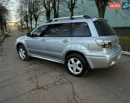 Серый Мицубиси Аутлендер, объемом двигателя 2.4 л и пробегом 320 тыс. км за 6000 $, фото 8 на Automoto.ua