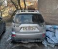 Серый Мицубиси Аутлендер, объемом двигателя 2.4 л и пробегом 155 тыс. км за 4500 $, фото 1 на Automoto.ua