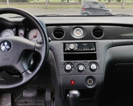 Серый Мицубиси Аутлендер, объемом двигателя 2.38 л и пробегом 323 тыс. км за 6800 $, фото 7 на Automoto.ua