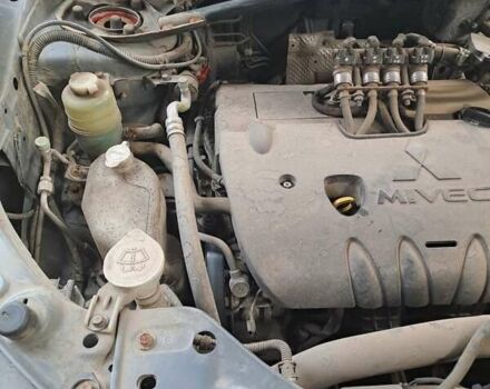 Сірий Міцубісі Аутлендер, об'ємом двигуна 2.4 л та пробігом 169 тис. км за 7000 $, фото 2 на Automoto.ua