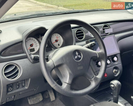 Серый Мицубиси Аутлендер, объемом двигателя 2.38 л и пробегом 254 тыс. км за 7300 $, фото 23 на Automoto.ua