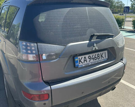 Сірий Міцубісі Аутлендер, об'ємом двигуна 2.4 л та пробігом 280 тис. км за 8600 $, фото 1 на Automoto.ua