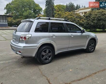 Серый Мицубиси Аутлендер, объемом двигателя 2.38 л и пробегом 200 тыс. км за 5600 $, фото 10 на Automoto.ua