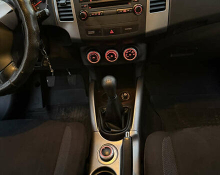 Серый Мицубиси Аутлендер, объемом двигателя 2.4 л и пробегом 210 тыс. км за 8300 $, фото 32 на Automoto.ua