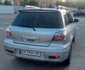 Серый Мицубиси Аутлендер, объемом двигателя 2 л и пробегом 169 тыс. км за 6800 $, фото 4 на Automoto.ua
