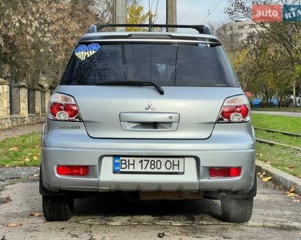 Серый Мицубиси Аутлендер, объемом двигателя 2.38 л и пробегом 170 тыс. км за 6900 $, фото 7 на Automoto.ua