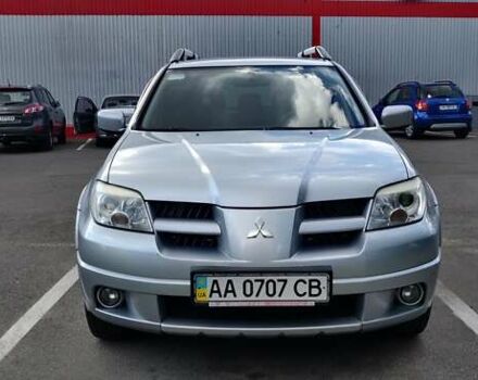 Серый Мицубиси Аутлендер, объемом двигателя 2.38 л и пробегом 323 тыс. км за 6800 $, фото 21 на Automoto.ua