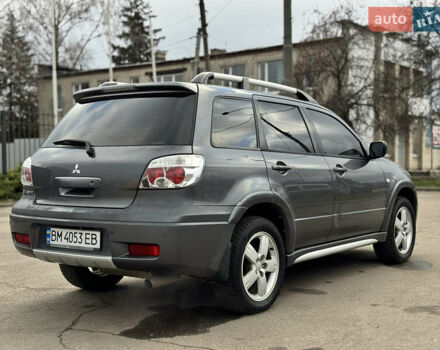 Серый Мицубиси Аутлендер, объемом двигателя 2.38 л и пробегом 254 тыс. км за 7300 $, фото 14 на Automoto.ua