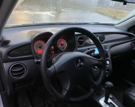 Сірий Міцубісі Аутлендер, об'ємом двигуна 2.4 л та пробігом 299 тис. км за 6300 $, фото 5 на Automoto.ua