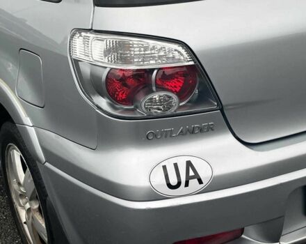 Сірий Міцубісі Аутлендер, об'ємом двигуна 2.4 л та пробігом 324 тис. км за 6890 $, фото 9 на Automoto.ua