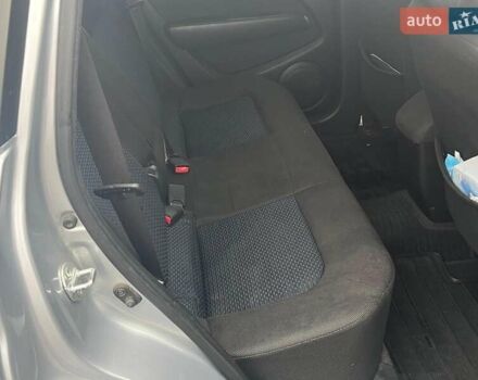 Серый Мицубиси Аутлендер, объемом двигателя 2.4 л и пробегом 324 тыс. км за 6890 $, фото 21 на Automoto.ua