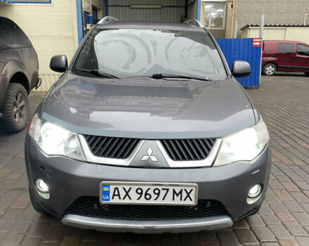 Серый Мицубиси Аутлендер, объемом двигателя 2.01 л и пробегом 345 тыс. км за 8100 $, фото 1 на Automoto.ua