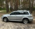 Серый Мицубиси Аутлендер, объемом двигателя 2.4 л и пробегом 225 тыс. км за 6500 $, фото 3 на Automoto.ua