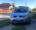 Сірий Міцубісі Аутлендер, об'ємом двигуна 1.97 л та пробігом 188 тис. км за 15800 $, фото 1 на Automoto.ua