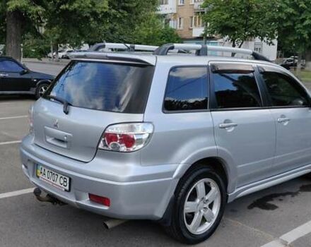 Серый Мицубиси Аутлендер, объемом двигателя 2.38 л и пробегом 323 тыс. км за 6800 $, фото 16 на Automoto.ua