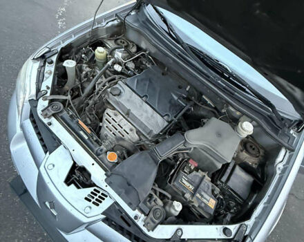 Сірий Міцубісі Аутлендер, об'ємом двигуна 2.4 л та пробігом 190 тис. км за 7500 $, фото 6 на Automoto.ua