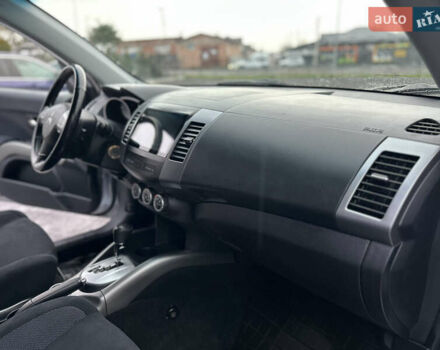 Серый Мицубиси Аутлендер, объемом двигателя 2.4 л и пробегом 61 тыс. км за 11300 $, фото 49 на Automoto.ua