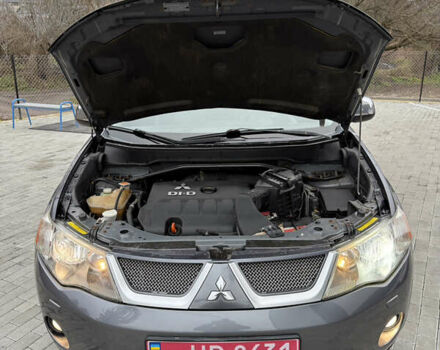 Сірий Міцубісі Аутлендер, об'ємом двигуна 2 л та пробігом 237 тис. км за 8999 $, фото 53 на Automoto.ua