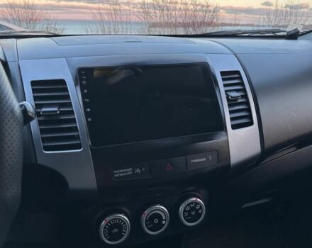 Серый Мицубиси Аутлендер, объемом двигателя 2.4 л и пробегом 321 тыс. км за 10000 $, фото 11 на Automoto.ua